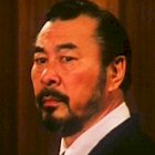 Roy Chiao in Dragons Forever (1988)