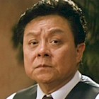 Bill Tung in Miracles (1989)