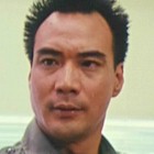 Norman Tsui in Tiger on Beat 2 (1991)